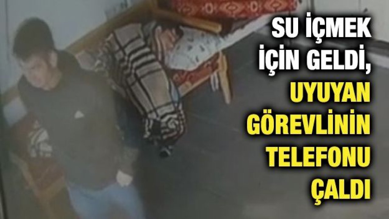 Su içmek için geldi, uyuyan görevlinin telefonu çaldı