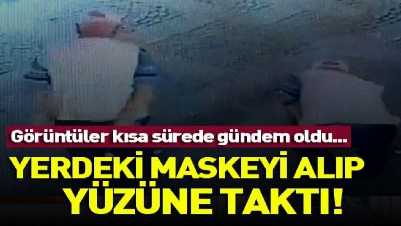 Yere atılan maskeyi alıp yüzüne taktı