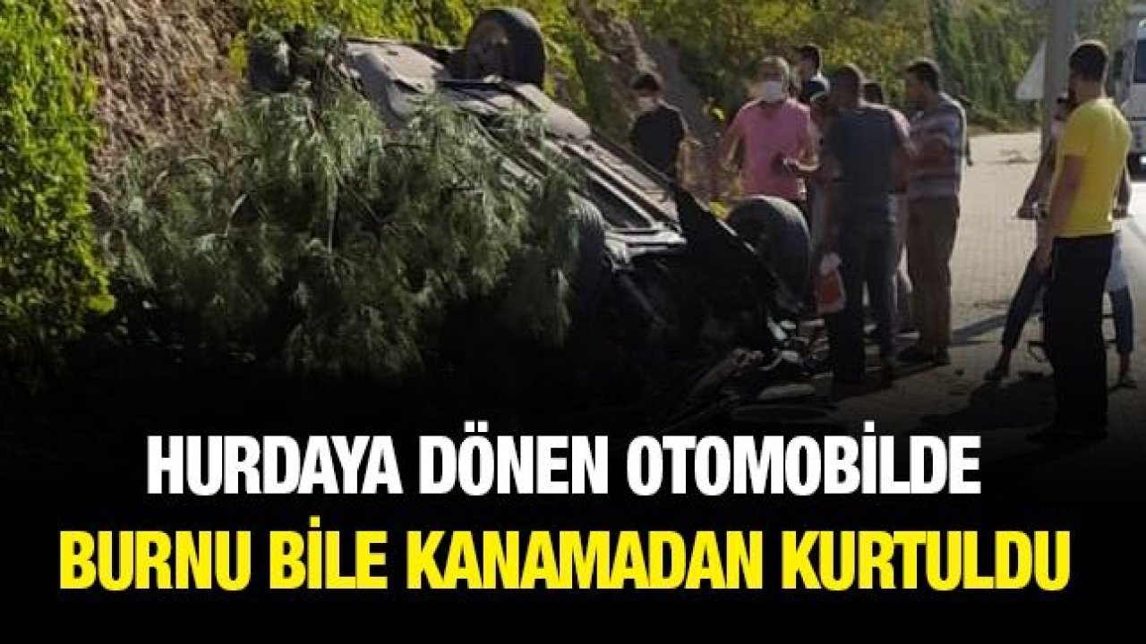 Hurdaya dönen otomobilde burnu bile kanamadan kurtuldu