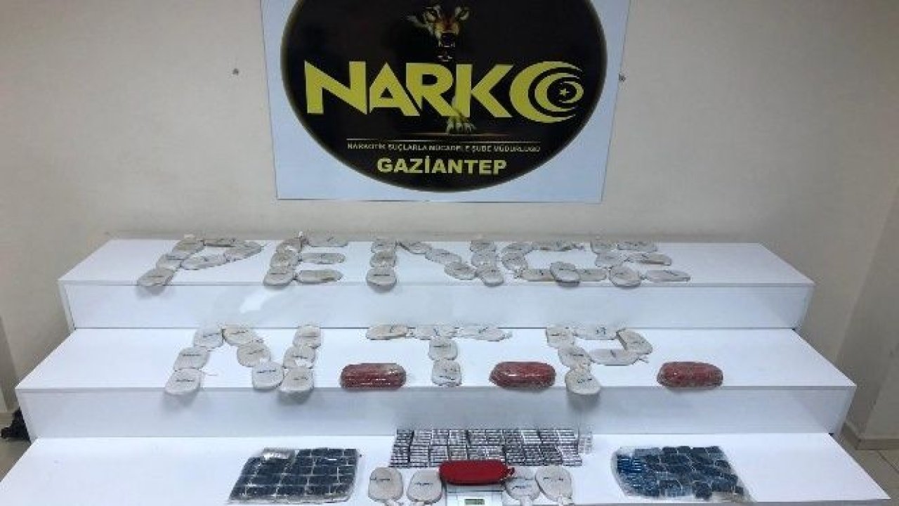 İş yerinin duvarından 14 kilo esrar ve 6 bin uyuşturucu hap çıktı