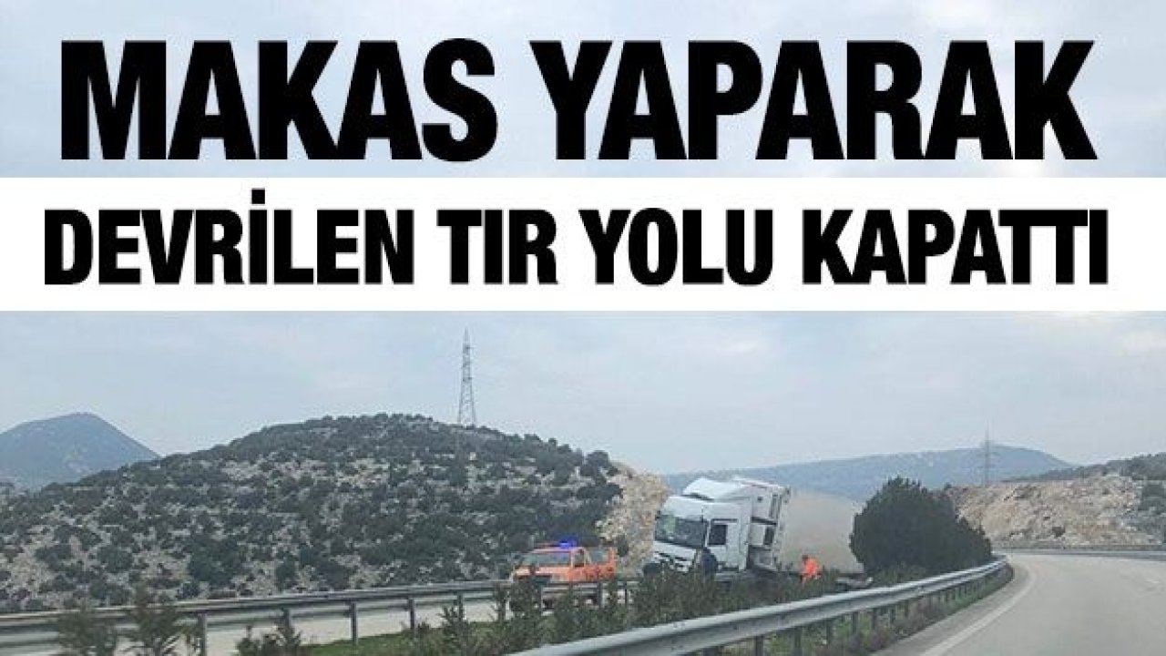 Makas yaparak devrilen tır yolu kapattı